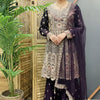 Woman wearing a purple heavily embroidered Indian ethnic suit with matching dupatta at Anandi Fashions boutique