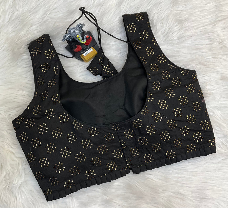 Back Opening Sleeveless Blouse