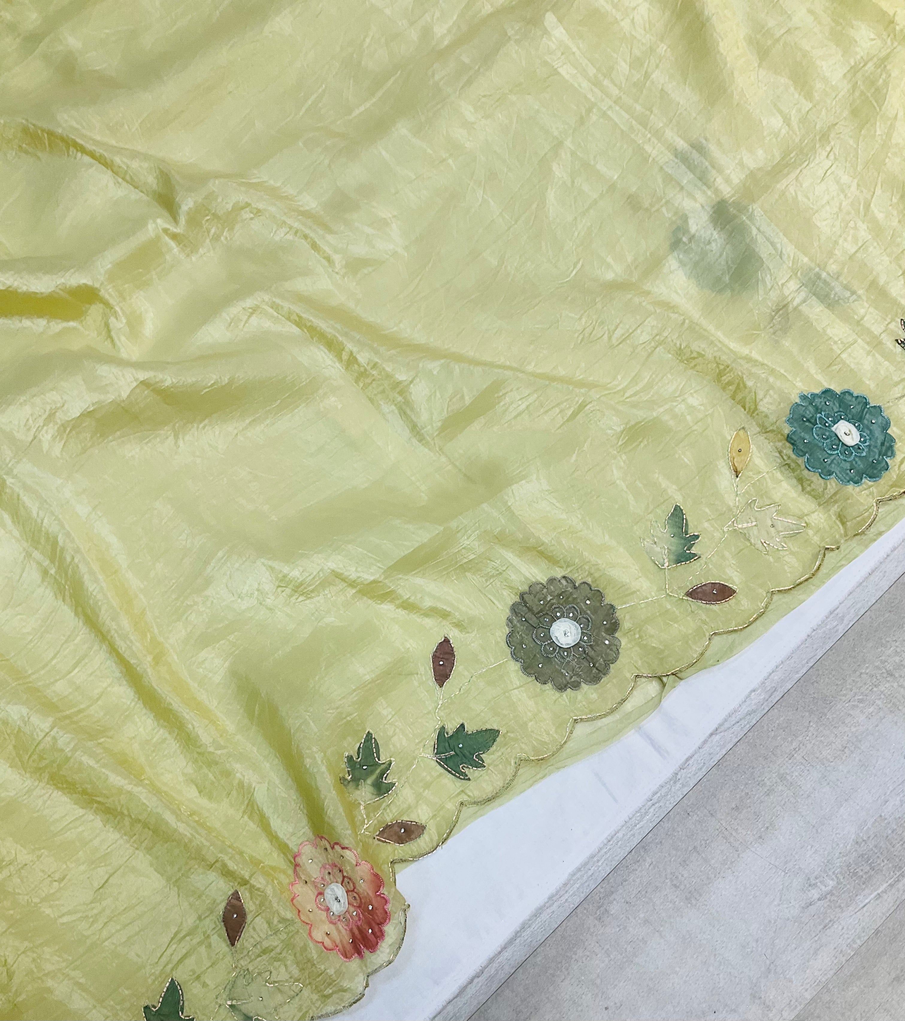 Glass tissue saree in pastel green