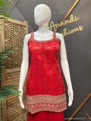 Red Indian ethnic sleeveless top with gold embroidery pattern on mannequin at Anandi Fashions boutique
