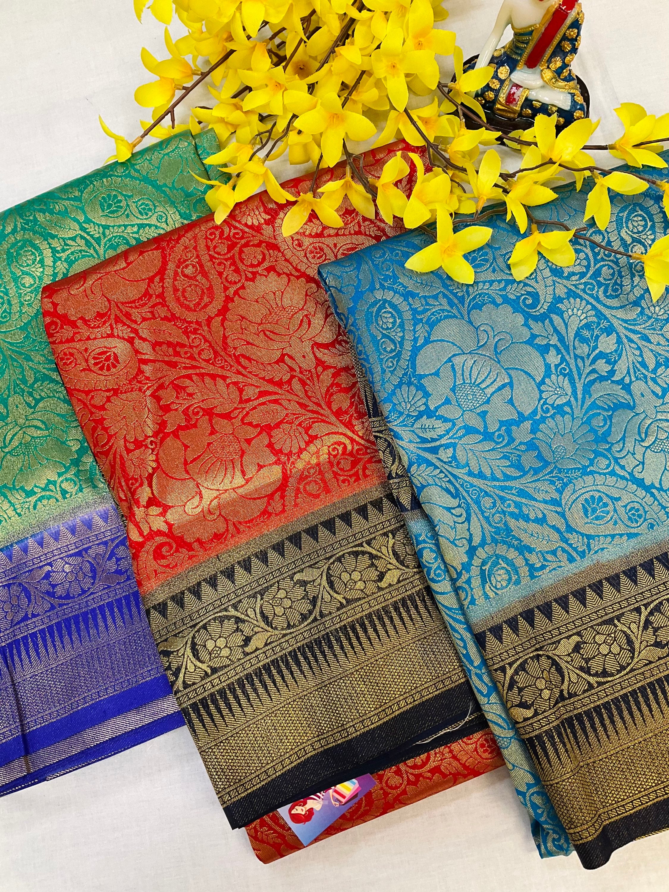 Red soft silk saree with jacquard design and navy blue border and pallu image 0