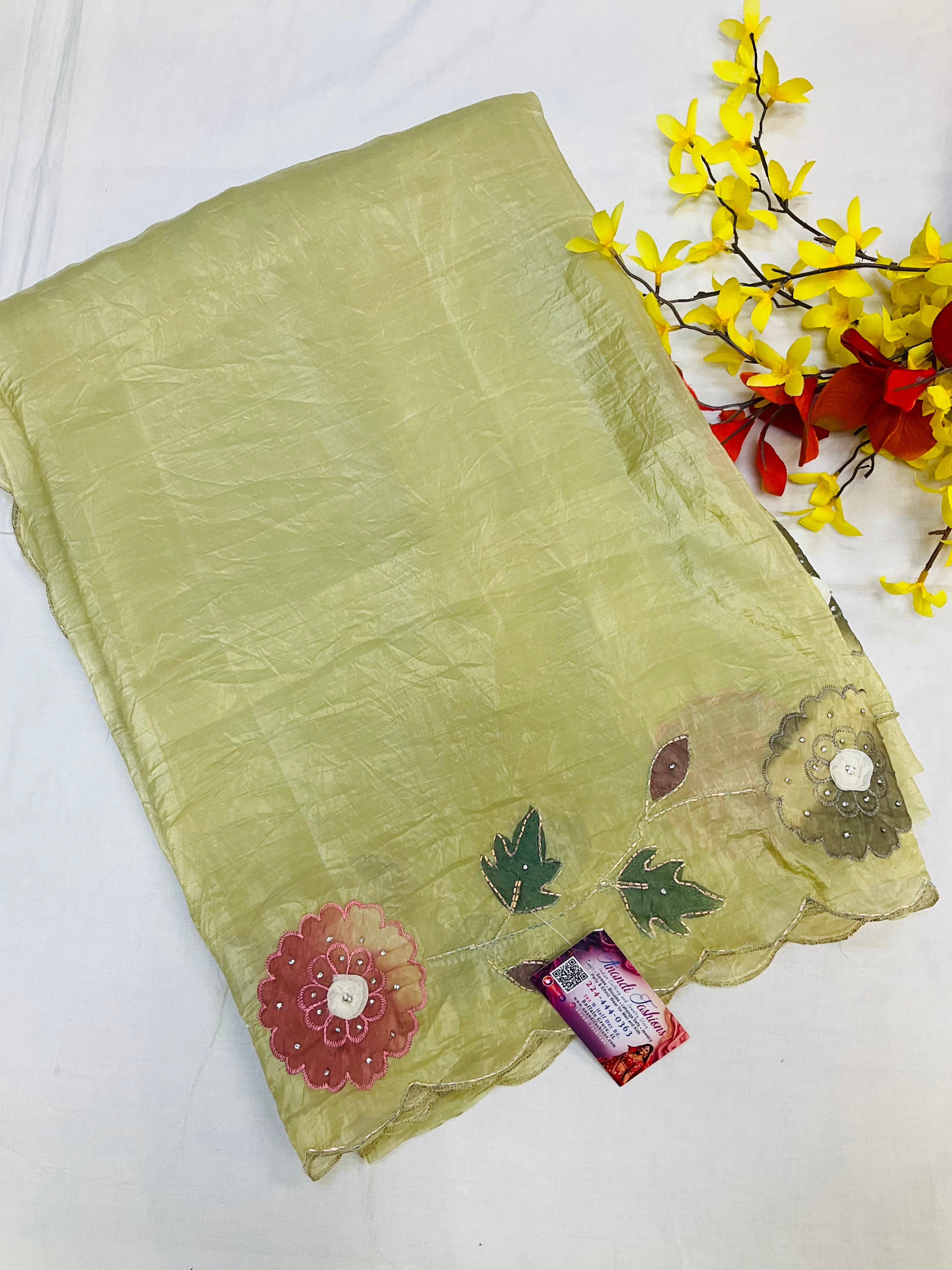 Glass tissue saree in pastel green