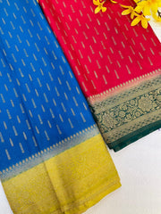 Blue and red Indian sarees with gold zari floral and traditional border designs, displayed on white background with yellow flowers