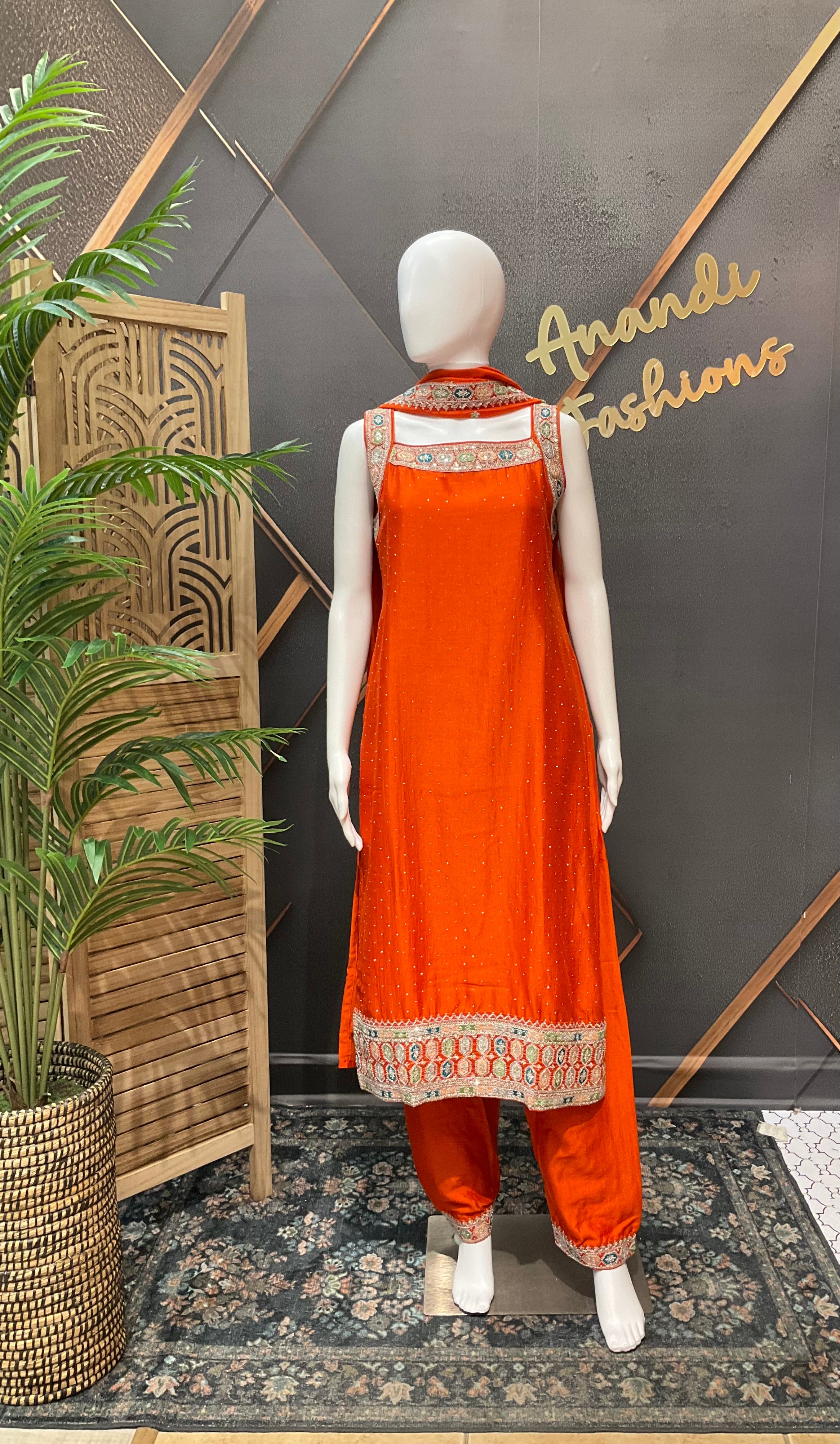 Women’s Orange Party Wear Sleeveless Kurti Set