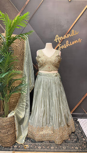 Pastel shade Tissue Designer Lehenga set with Heavy Work