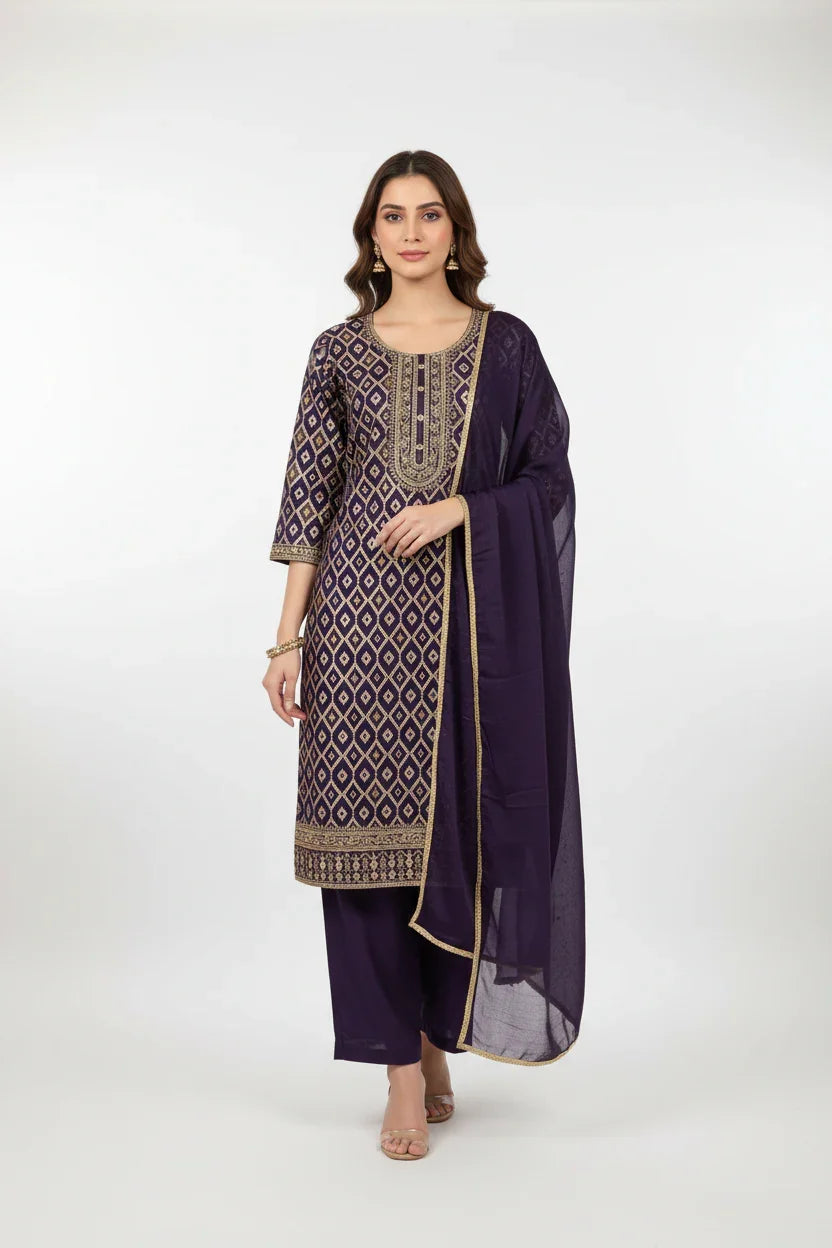 Woman wearing elegant purple Indian ethnic wear with gold embroidery, matching dupatta and pants