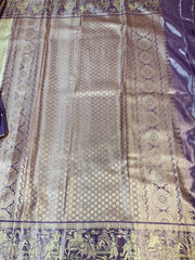 Half White Semi Kanjeevaram Saree with Stitched Maggam Blouse
