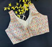 Half White Embroidery Work Blouse- Sleeveless