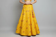 Yellow Indian ethnic lehenga skirt with red floral embroidery and sequin details from Anandi Fashions