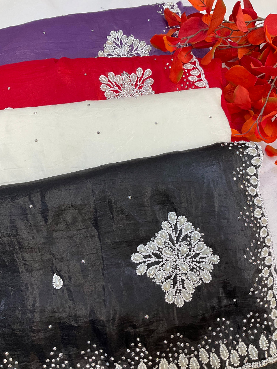 Crushed tissue saree with pearl bead work image 0