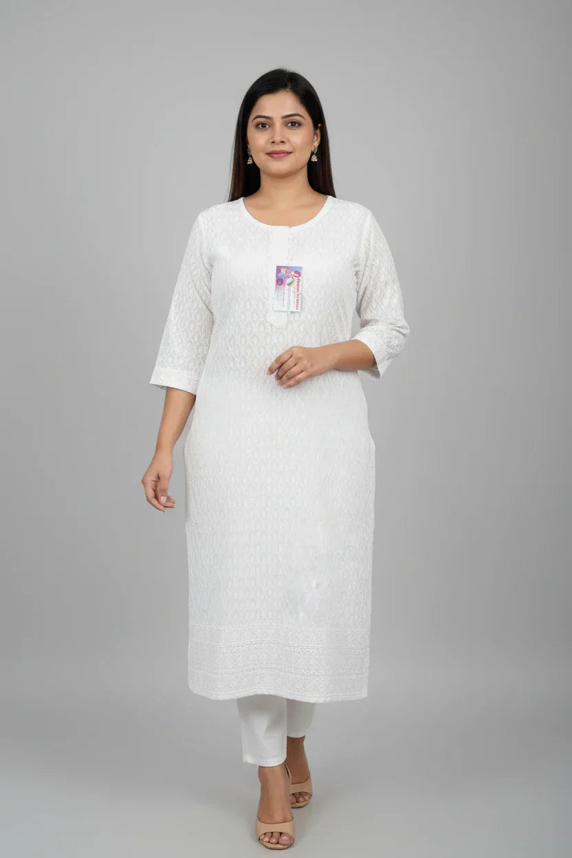Woman wearing white Indian ethnic kurti with subtle patterns and three-quarter sleeves at Anandi Fashions