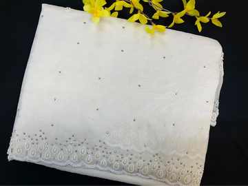 Crushed tissue saree with pearl bead work