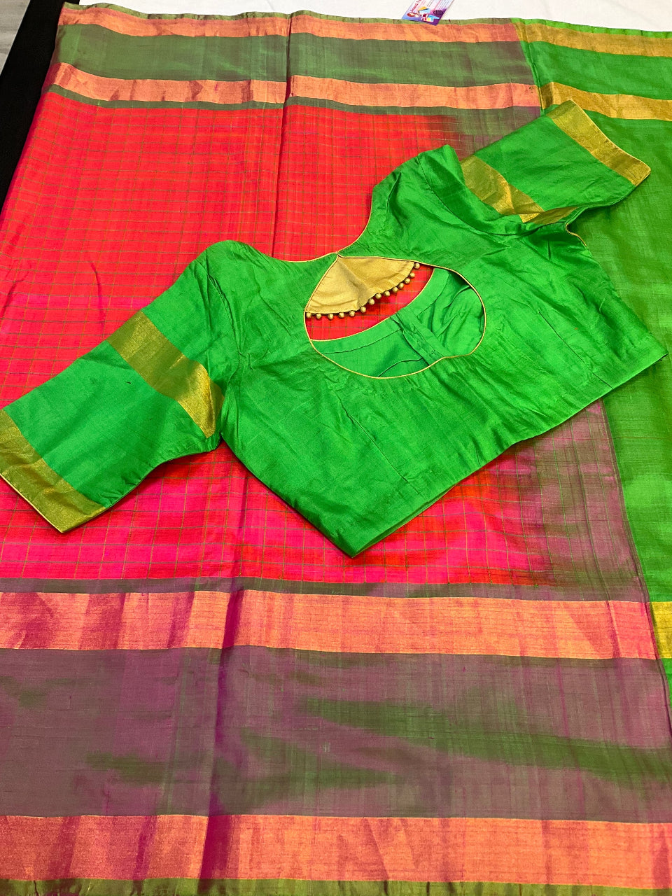 Pinkish Orange Premium  Uppada Silk Checks saree image 2