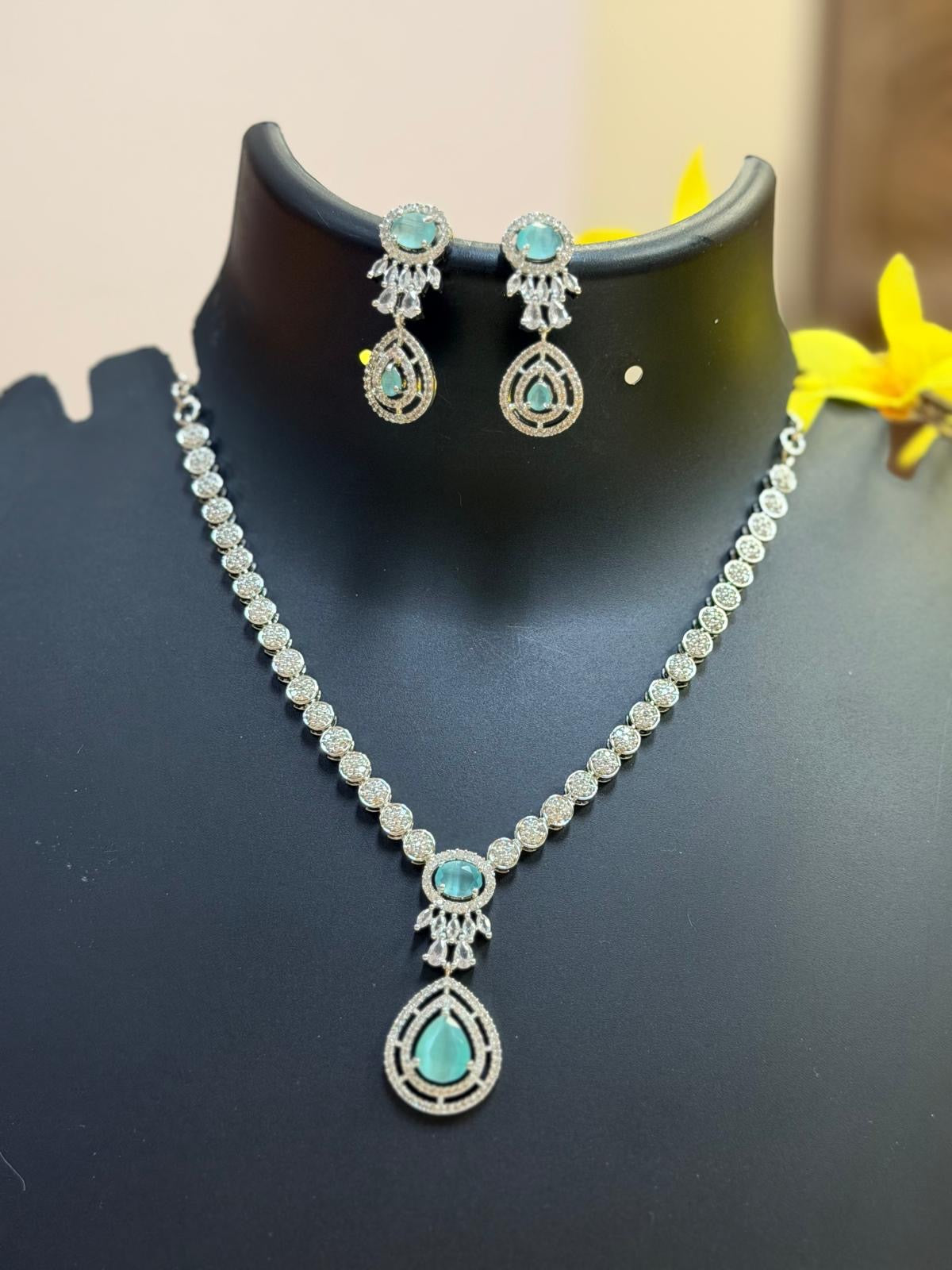 Silver Finish CZ Necklace set with Aqua Blue Stones