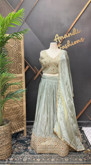Pastel shade Tissue Designer Lehenga set with Heavy Work