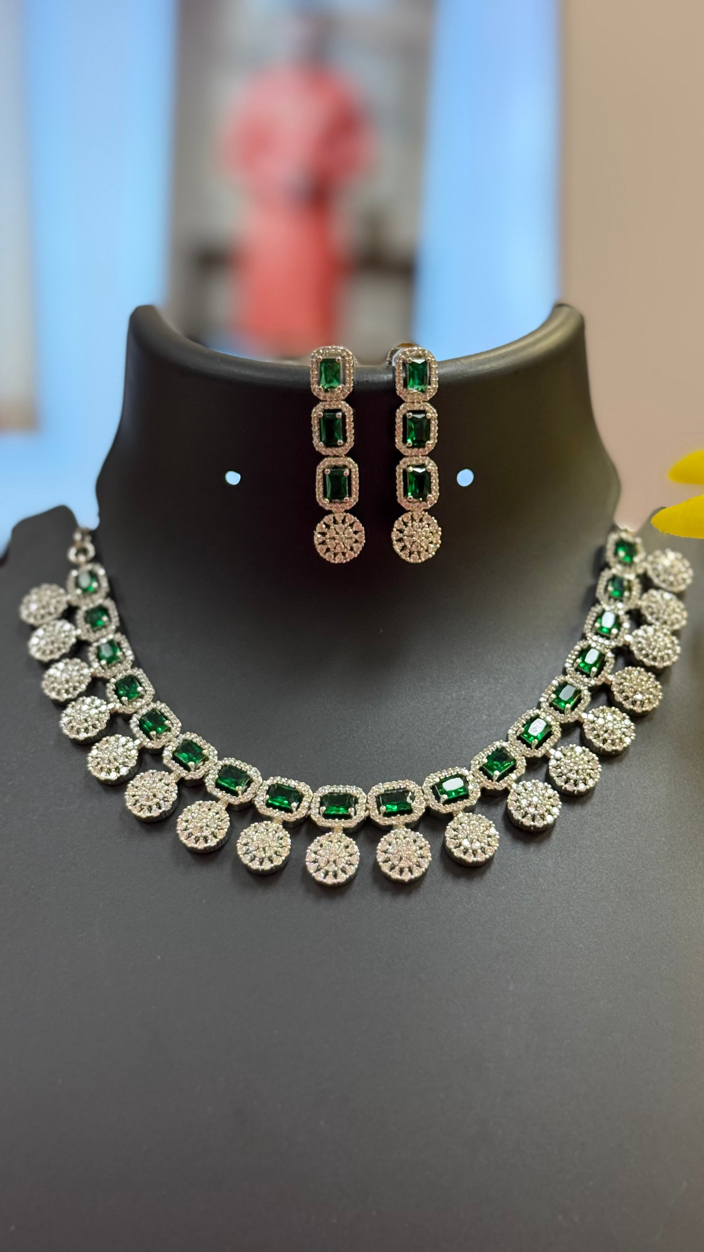 Silver Finish Necklace set with Emerald stones