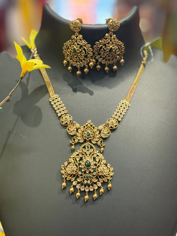 Antique Finish Necklace Set with Emerald Stones & AD Pendant