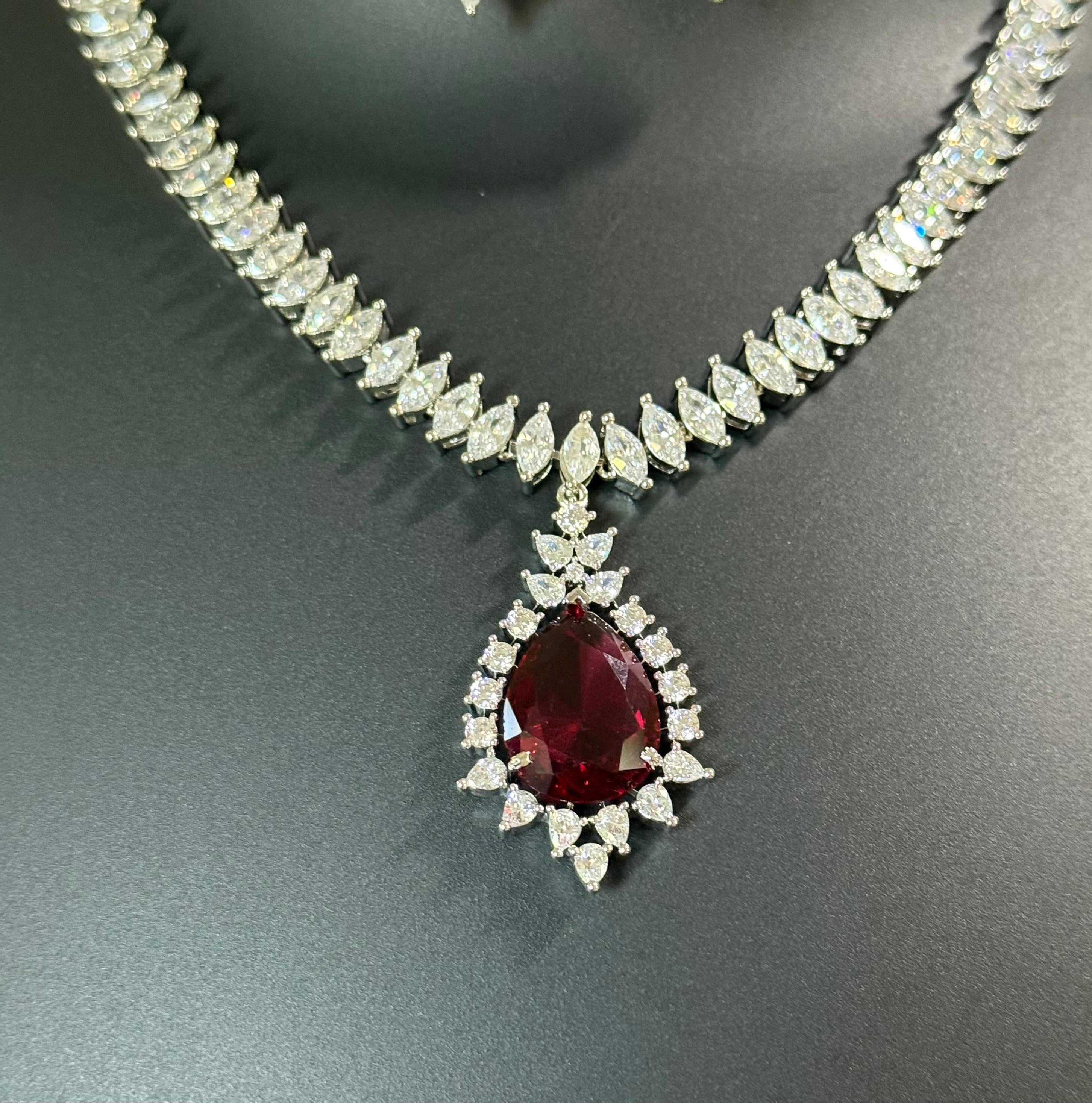 Party Wear Silver Finish Necklace set with Red Stone