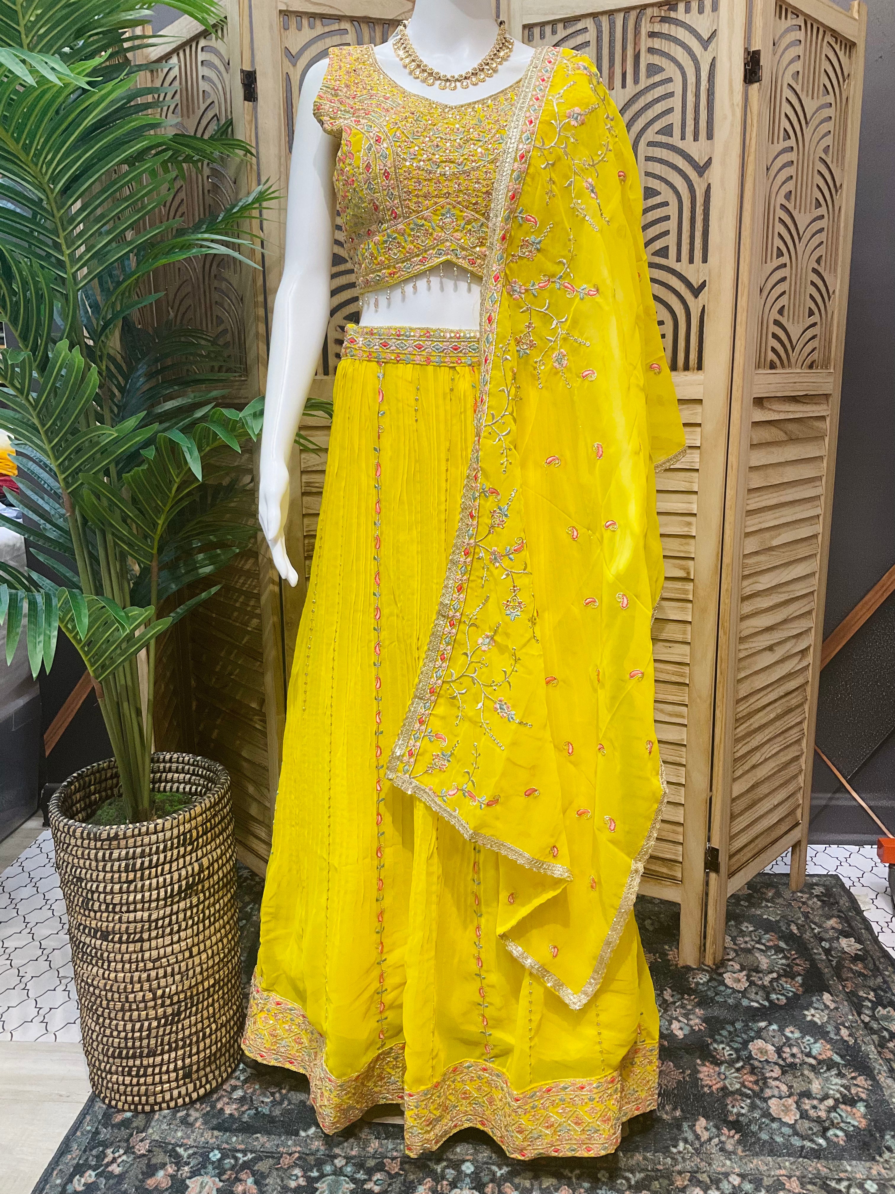 Marigold Magic: Yellow Lehenga Set Paired with Dupatta