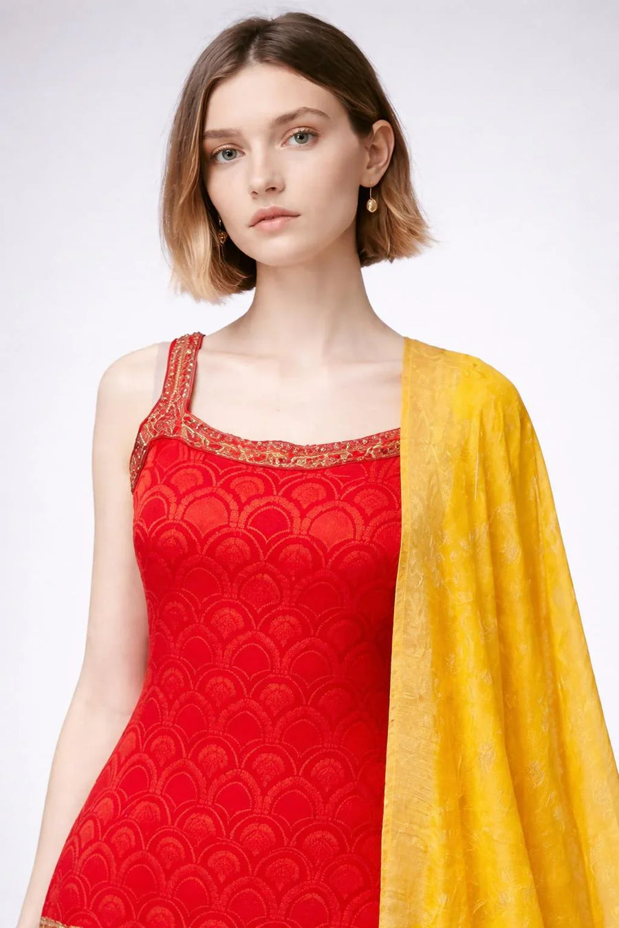 Close-up of the model wearing Red Sleeveless Sharara Set with Gold Zari Work - Premium Party Wear