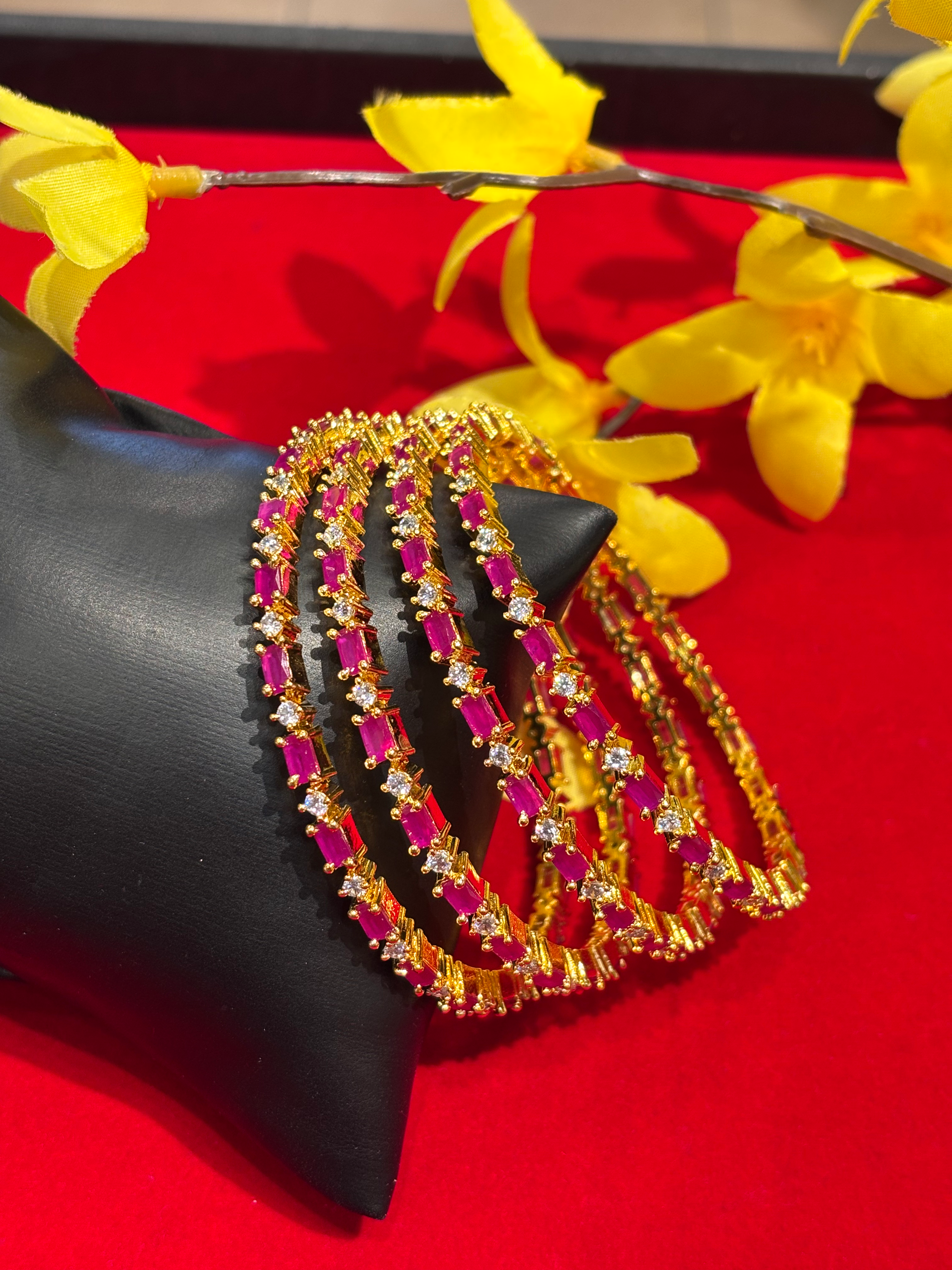 Set of 4 thin Bangles With Ruby Stones image 0