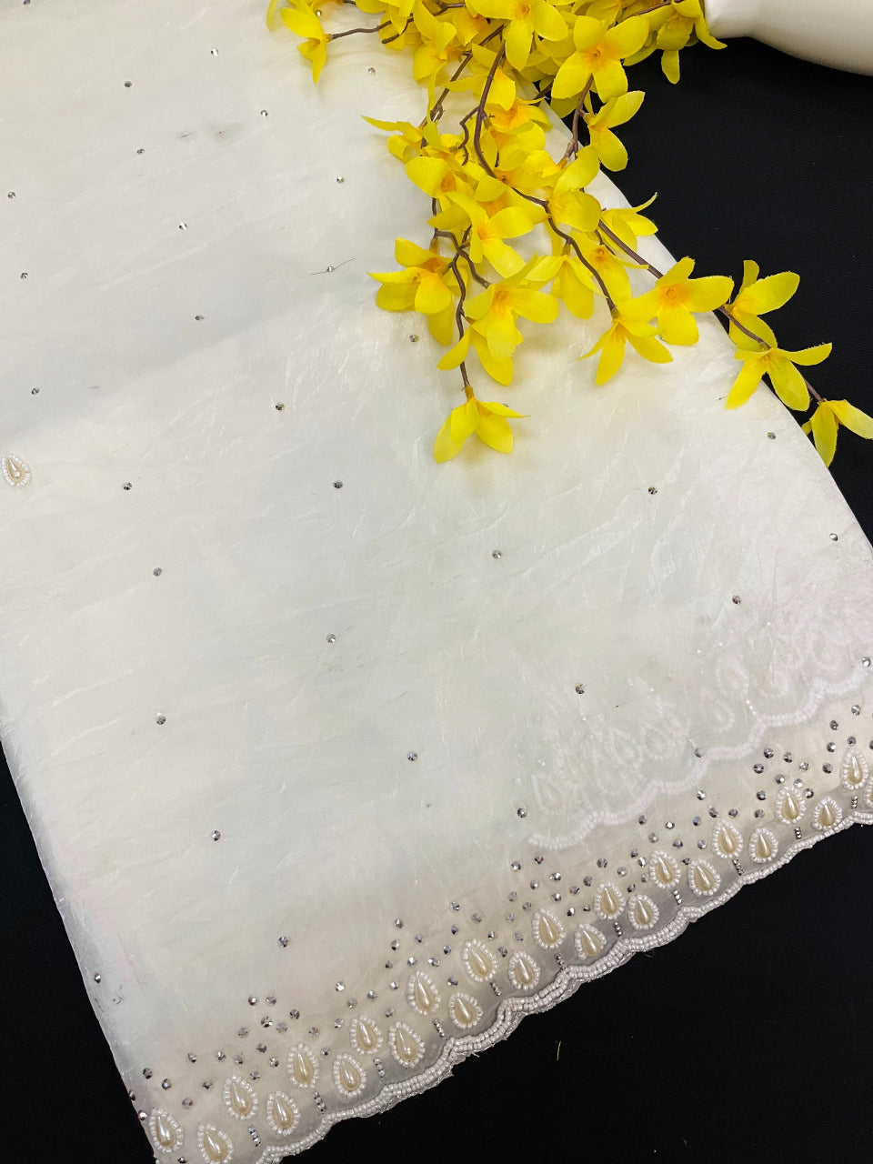 Crushed tissue saree with pearl bead work image 8