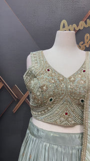 Pastel shade Tissue Designer Lehenga set with Heavy Work